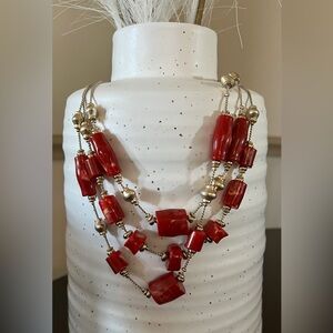 Chico’s red bead and gold necklace.